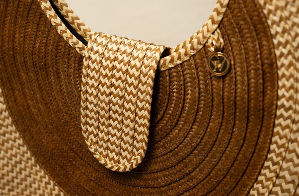 Handwoven palm leaf purse with artisan craftsmanship