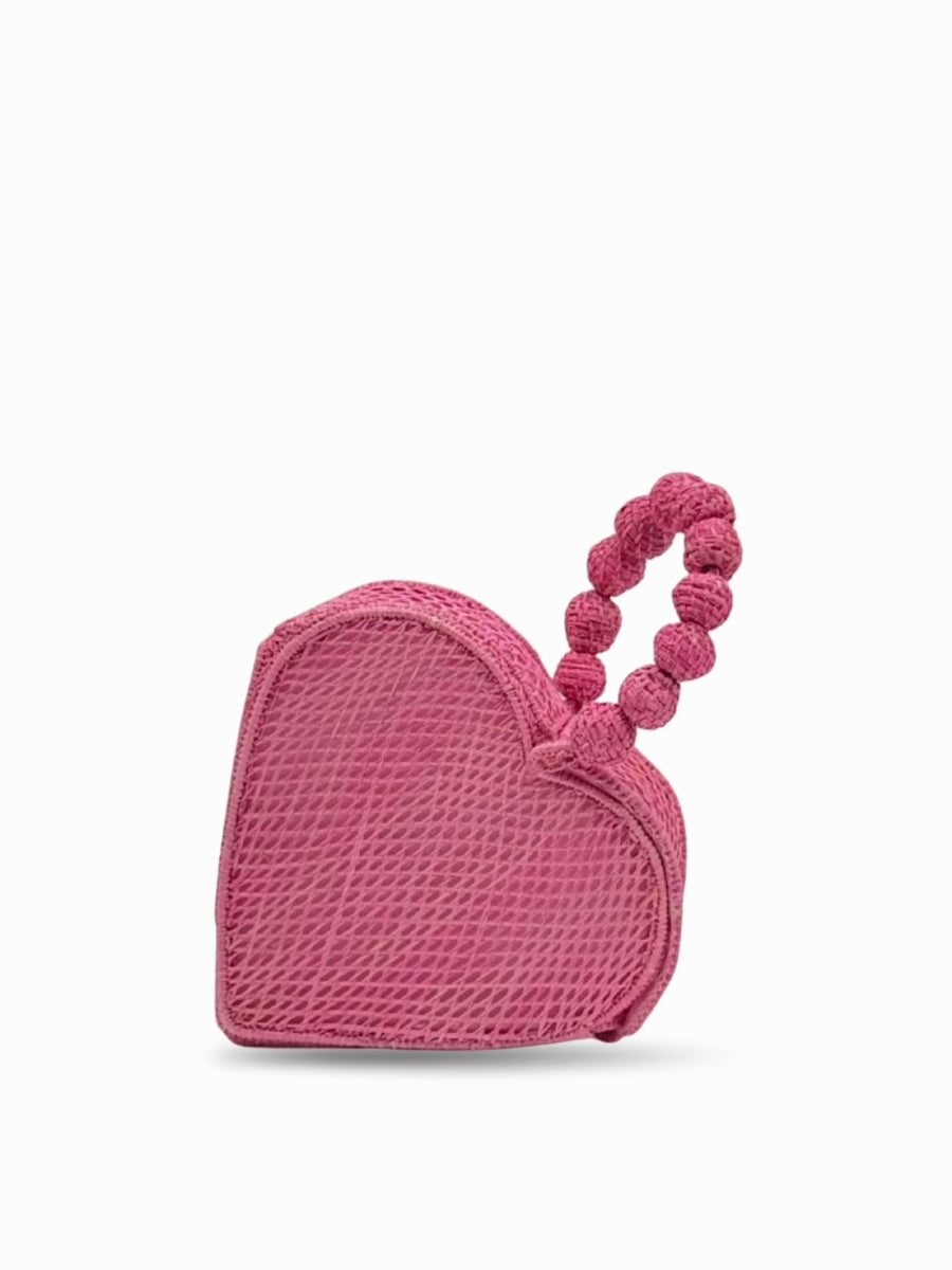 Handmade rattan fashion bag with natural tones