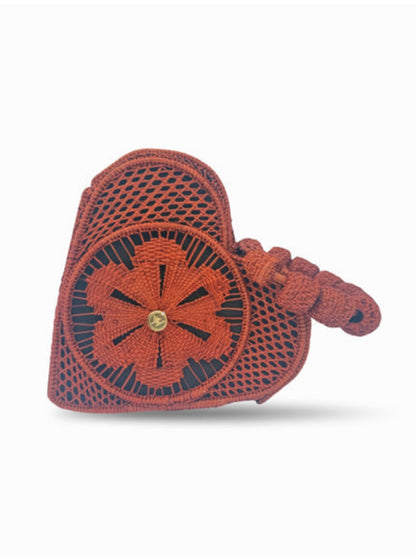 Traditional woven rattan bag crafted by women artisans