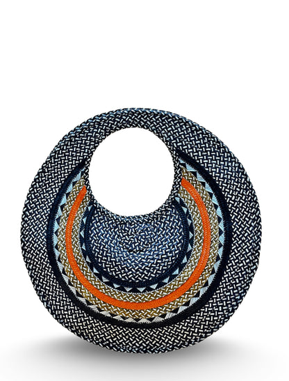 Handwoven palm bag inspired by Colombian artisan crafts
