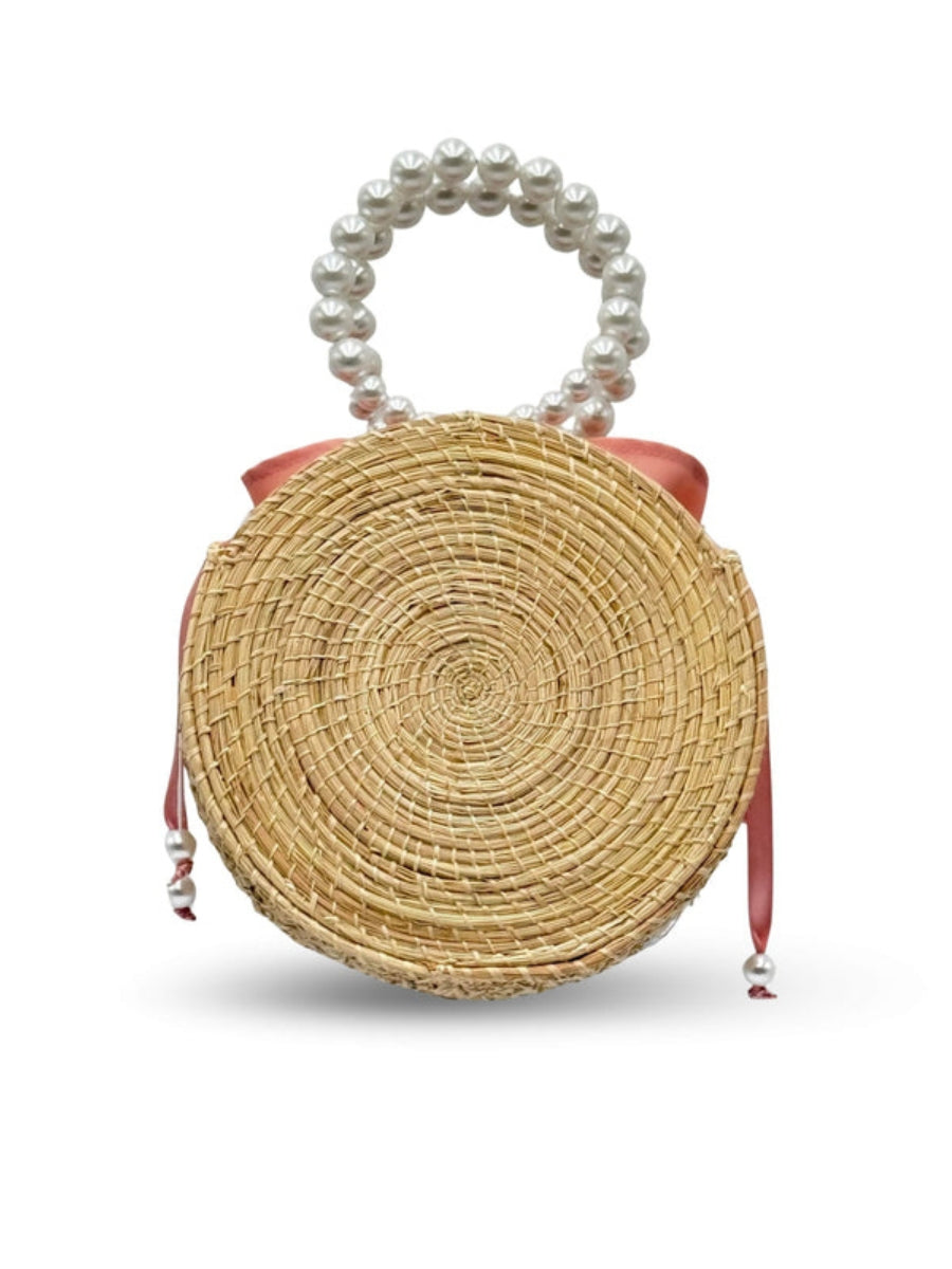 Artisan-made woven rattan handbag
