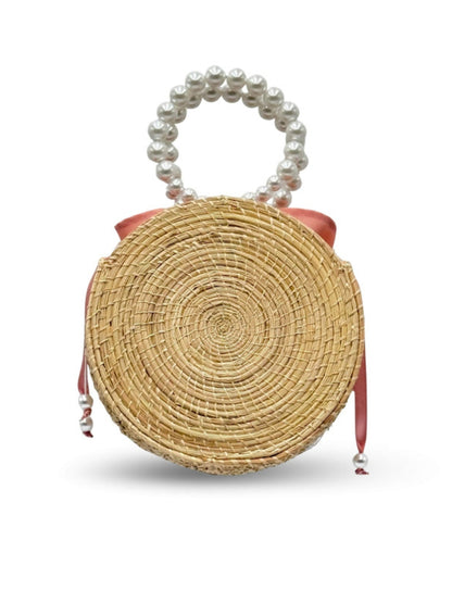 Artisan-made woven rattan handbag
