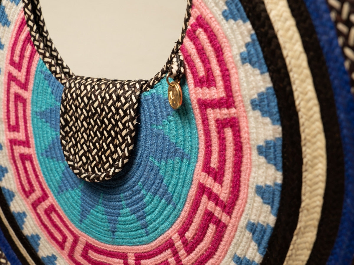 Handmade palm leaf bag with artisan woven detailing