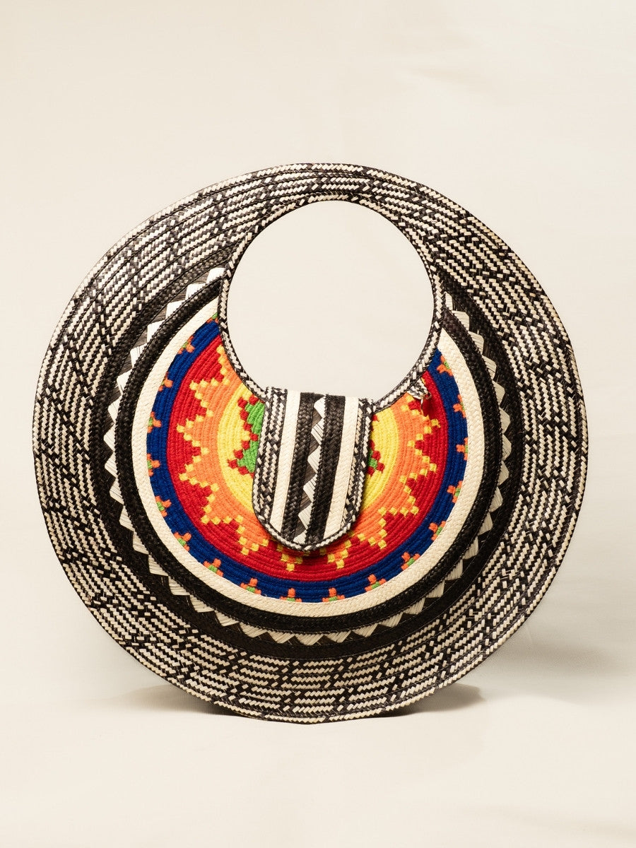 Handwoven palm leaf bag with traditional artisan design