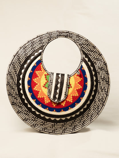 Handwoven palm leaf bag with traditional artisan design