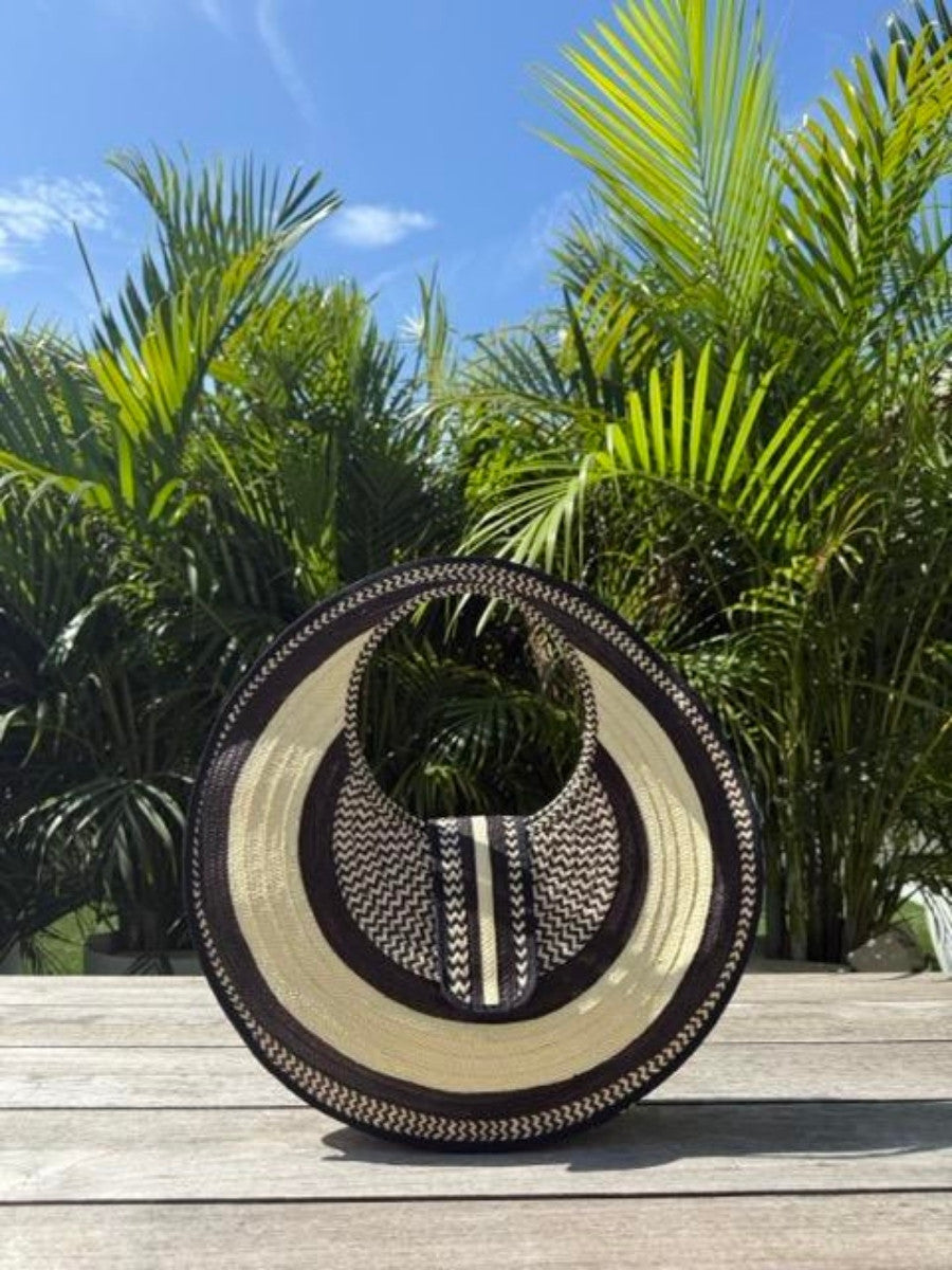 Handwoven palm leaf bag with artisan craftsmanship