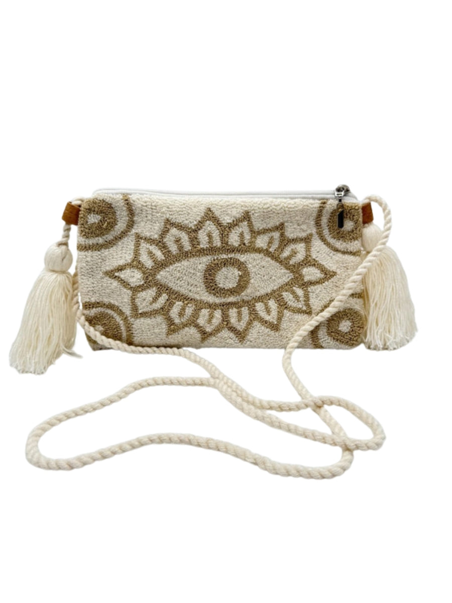 Handcrafted crossbody clutch bag inspired by artisan craftsmanship