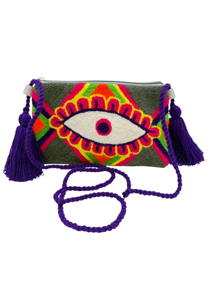 Evil eye crossbody clutch with colorful woven pattern