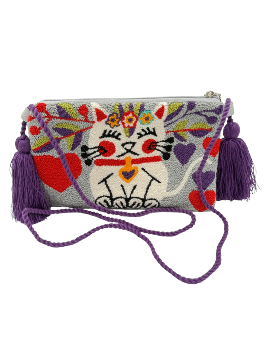 Crossbody clutch bag with unique evil eye artwork