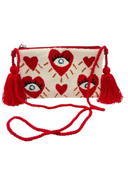 Decorative evil eye crossbody clutch bag