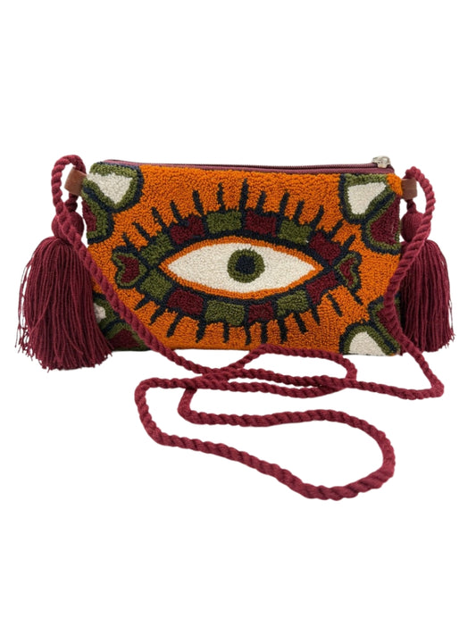 Evil eye crossbody clutch with artisan design