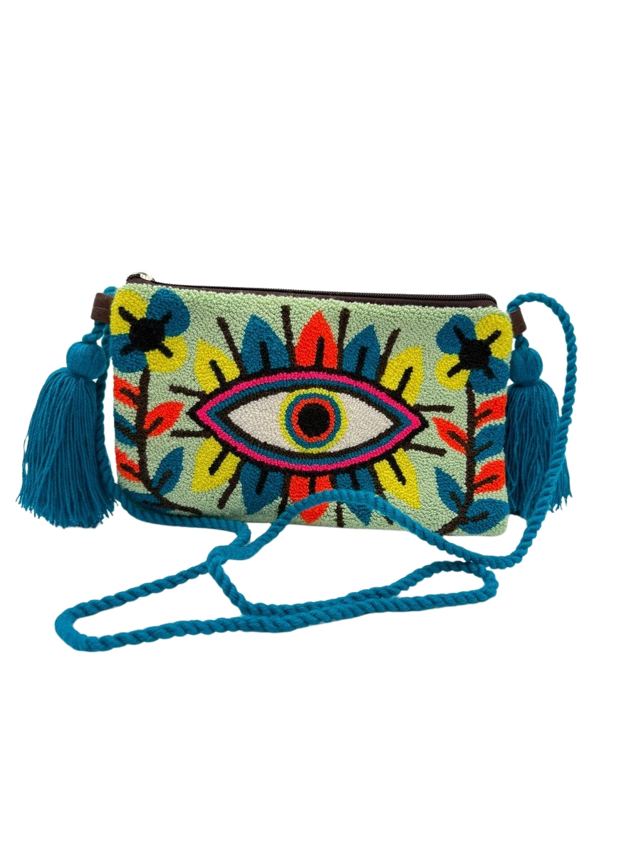 Woven crossbody clutch bag with artisan detailing
