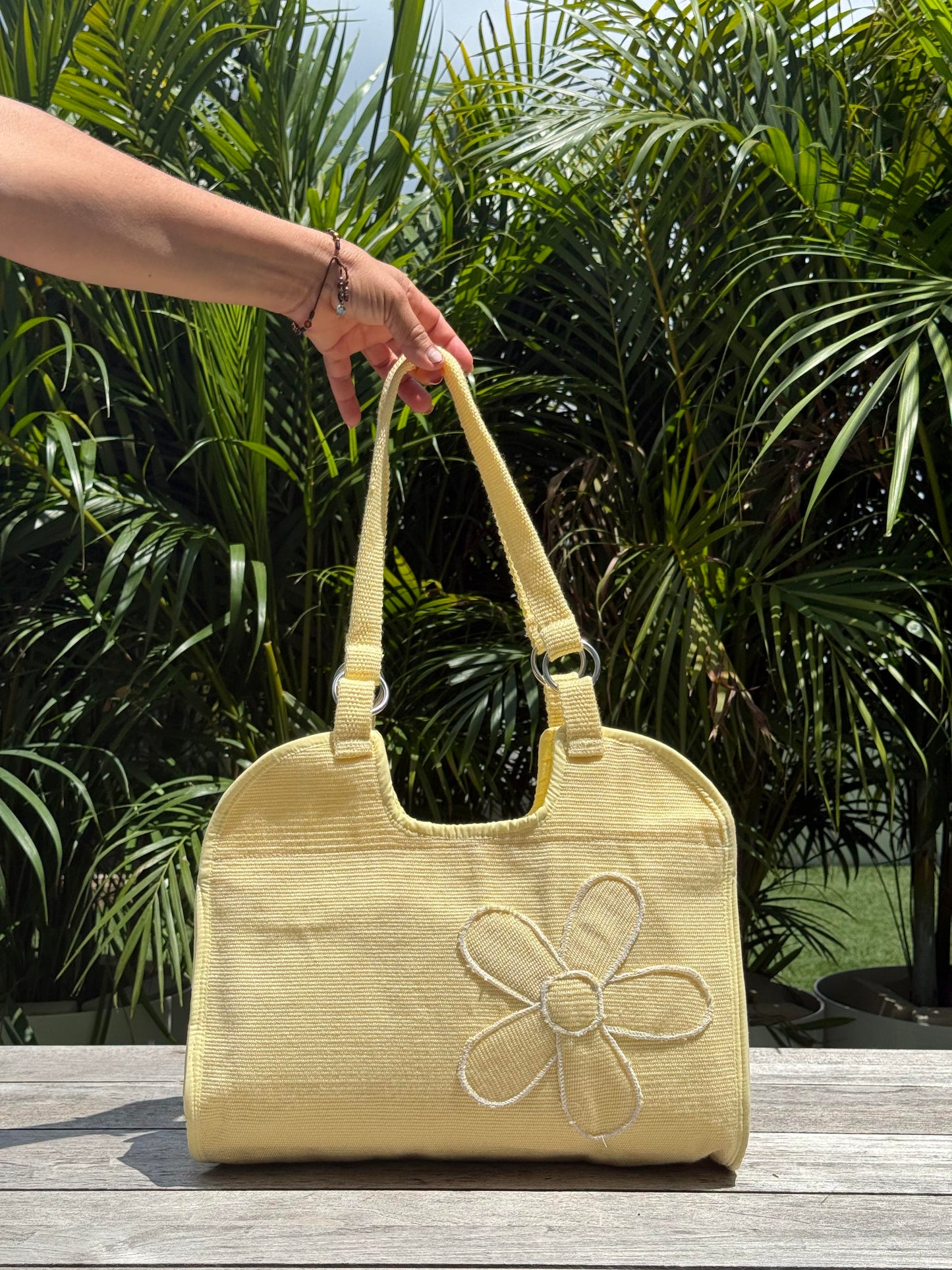 Handwoven shoulder bags with traditional textile pattern