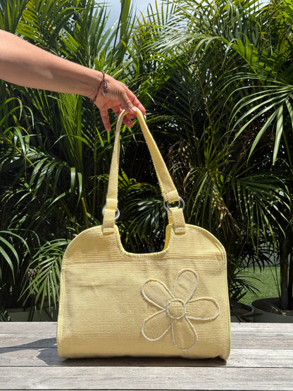 Handwoven shoulder bags with traditional textile pattern