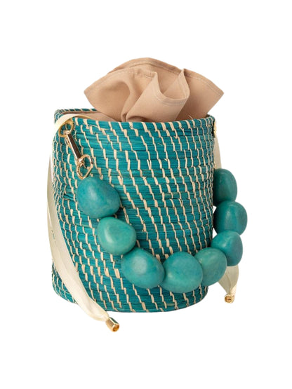 Rattan bucket bag crafted by Colombian artisans