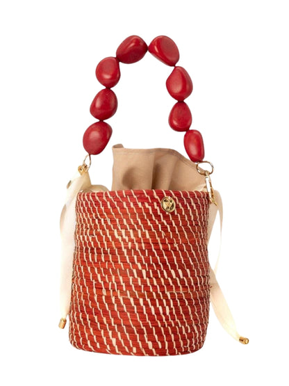 Handmade Colombian rattan bag with earthy natural finish