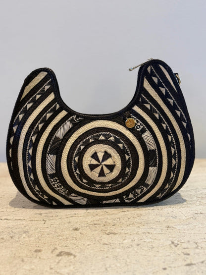 Handmade palm leaf bag with unique artisan finish