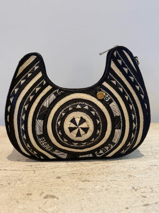 Handmade palm leaf bag with unique artisan finish