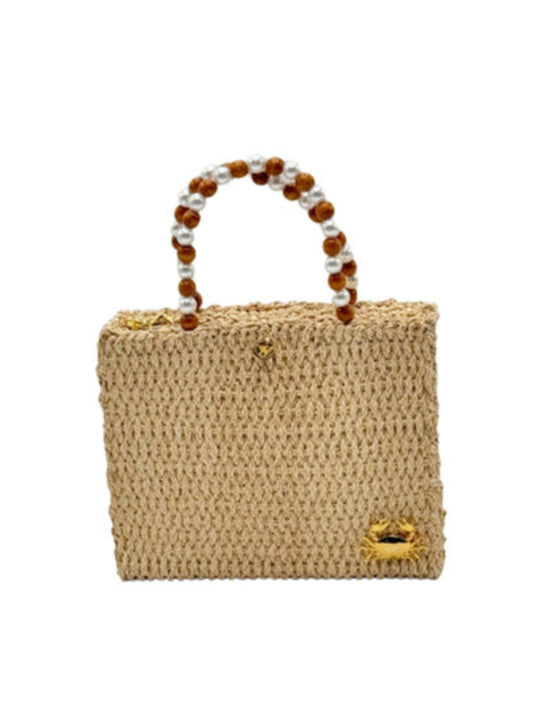 Mar handmade rattan bag with woven natural design