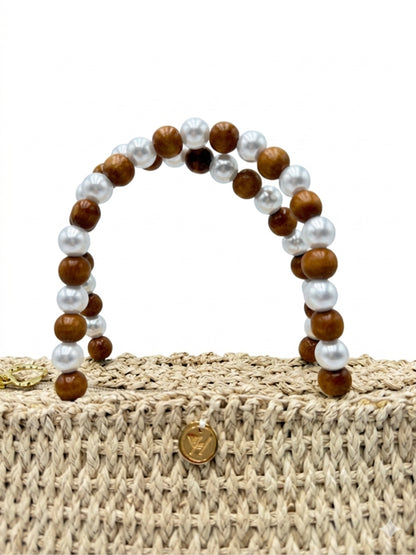 Artisan-made woven rattan handbag