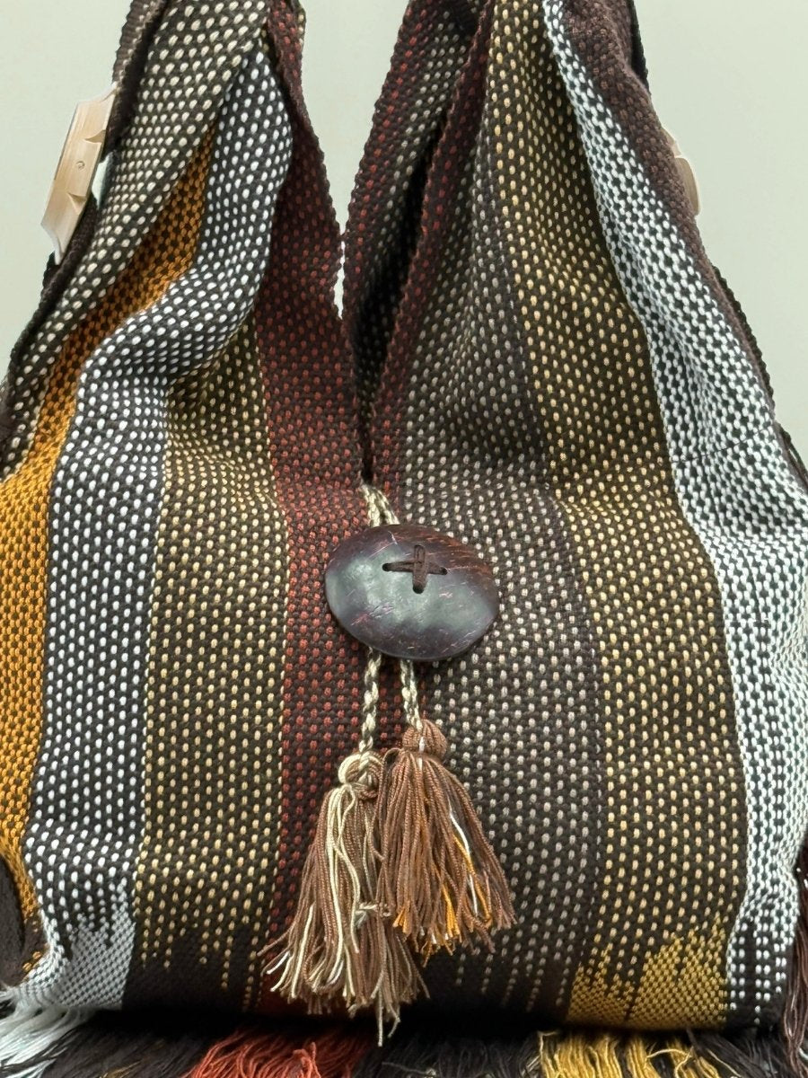Artisan-crafted shoulder bag with traditional craftsmanship