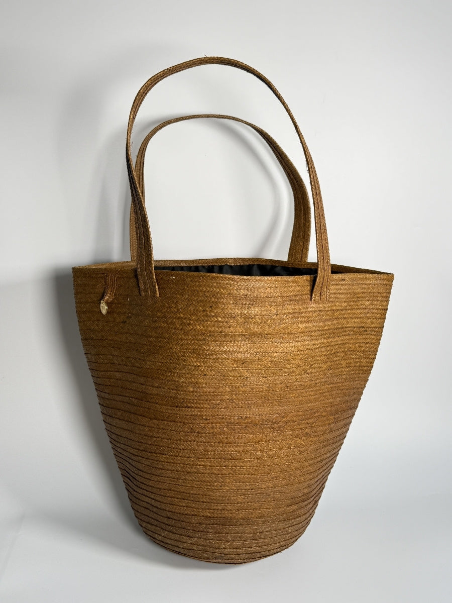 Handmade palm bag inspired by Colombian artisan crafts