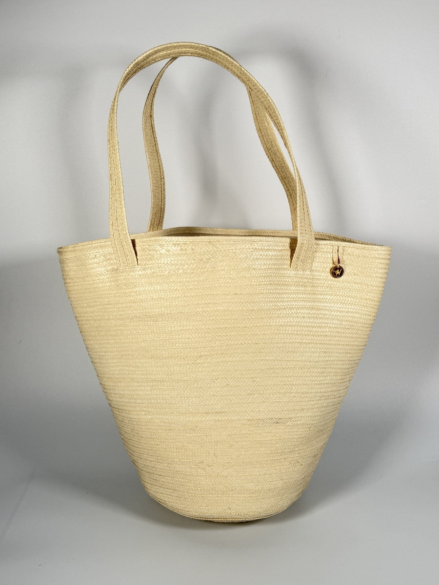 Sunrise palm bag handcrafted by artisan families from Colombia