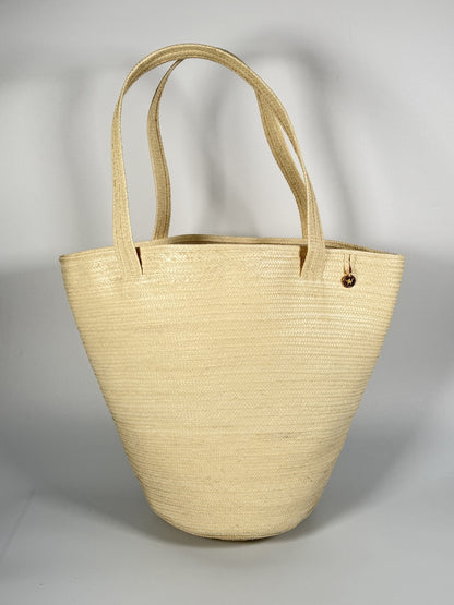 Sunrise palm bag handcrafted by artisan families from Colombia