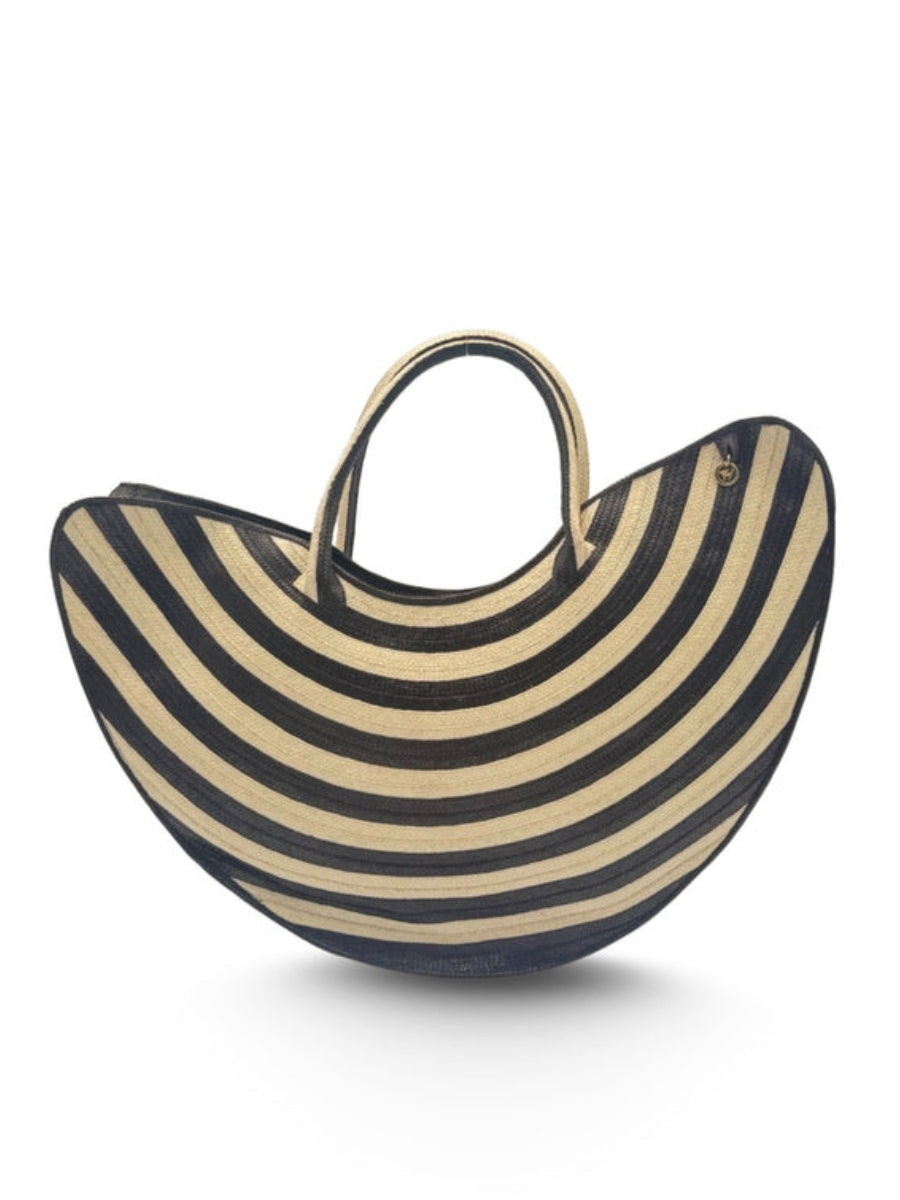The Savara Bag with elegant handwoven palm design