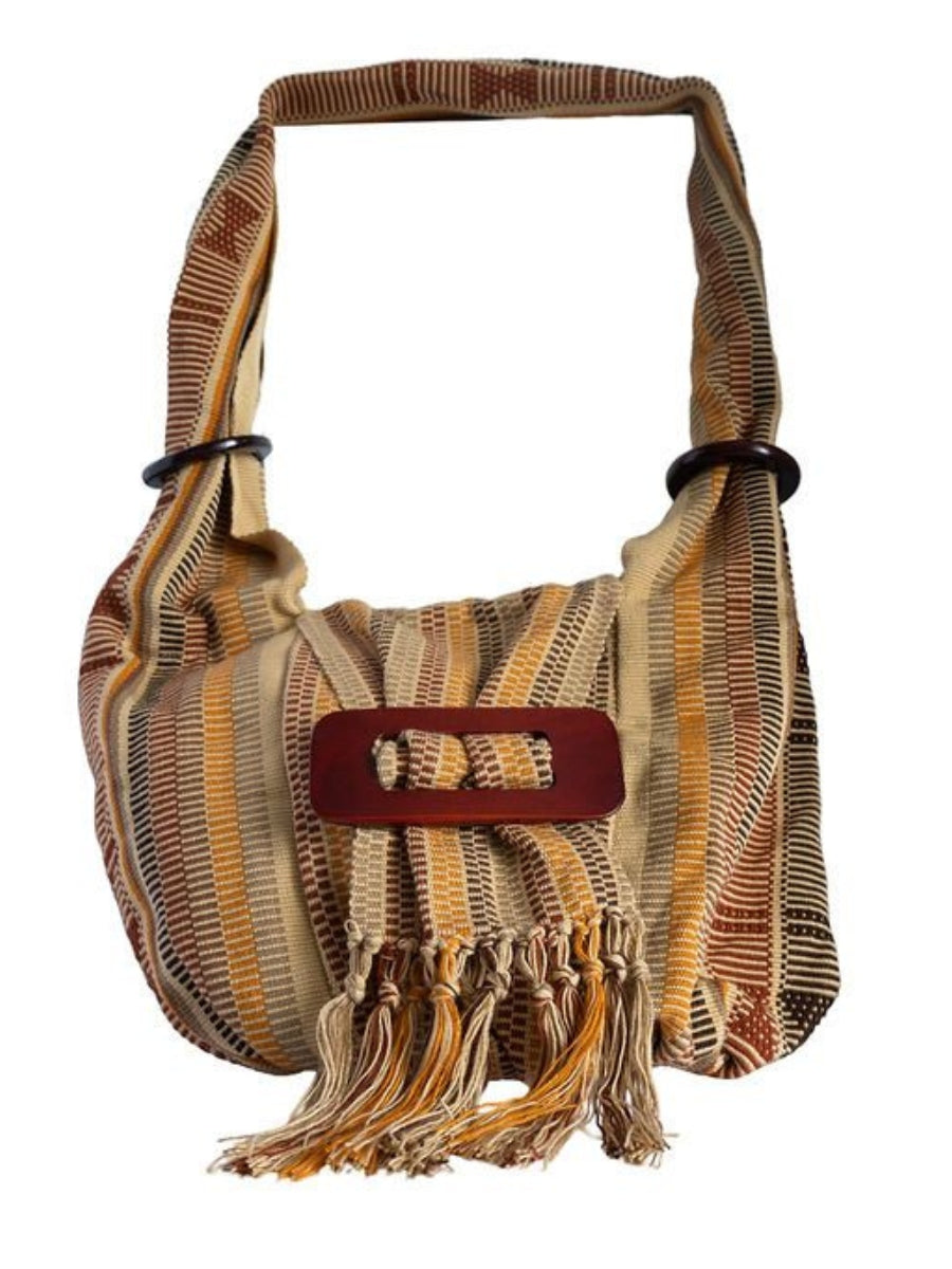 Woven handbag with fringes and a brown buckle