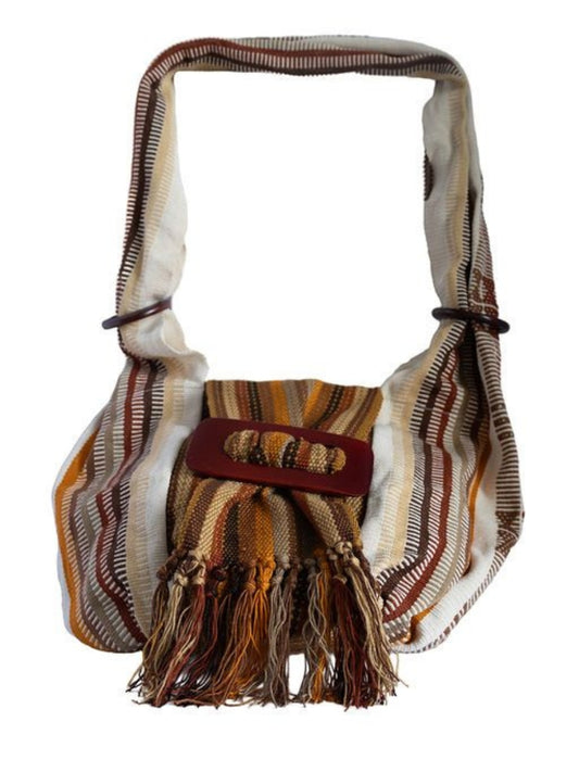 Striped handbag with fringes on a white background
