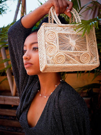 Artisan-made woven rattan handbag